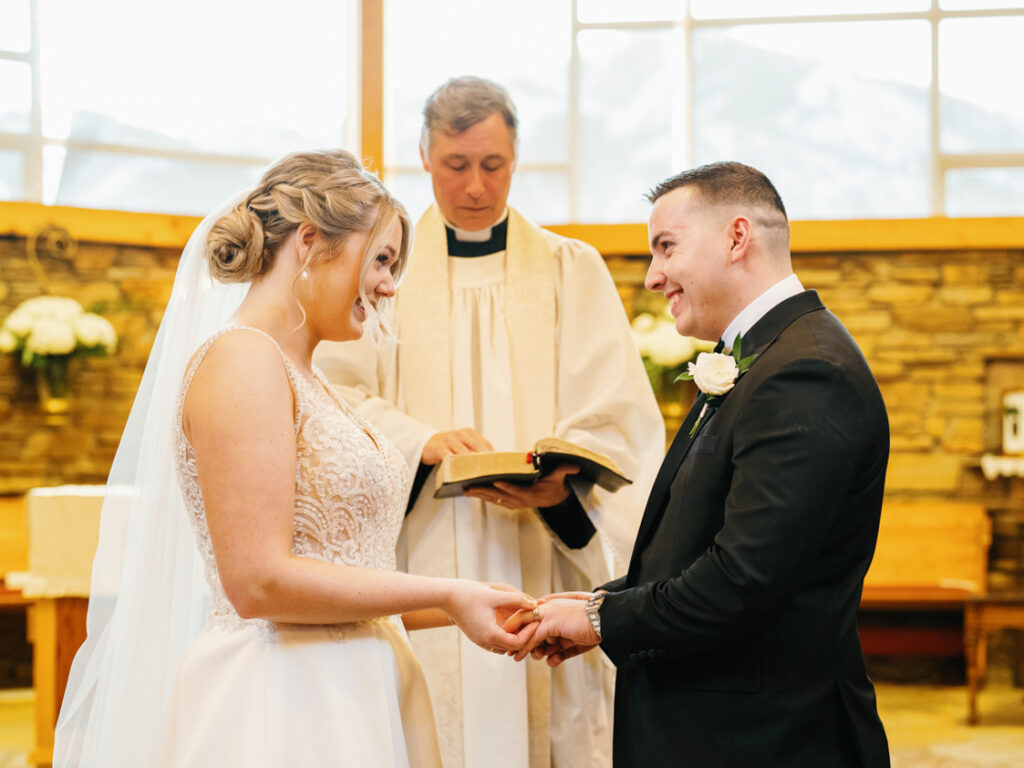 Vows during ceremony at Saint Thomas Episcopal Church in Sun Valley