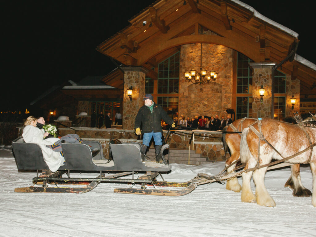 Bride and groom in sleigh at Sun Valley Club Wedding