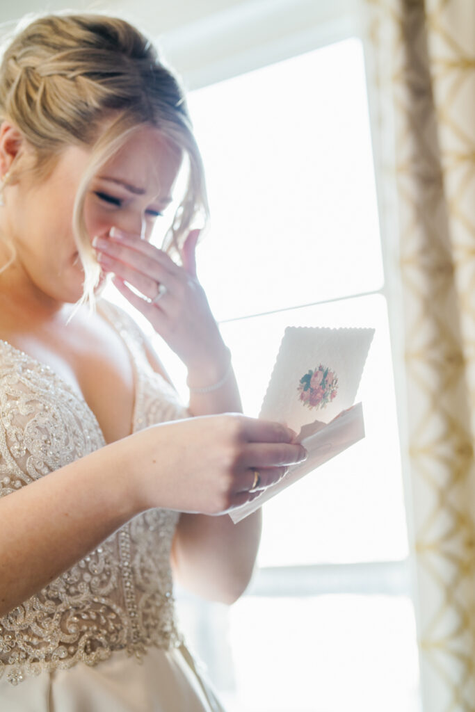 A bride read a letter from her parents at Sun Valley Lodge