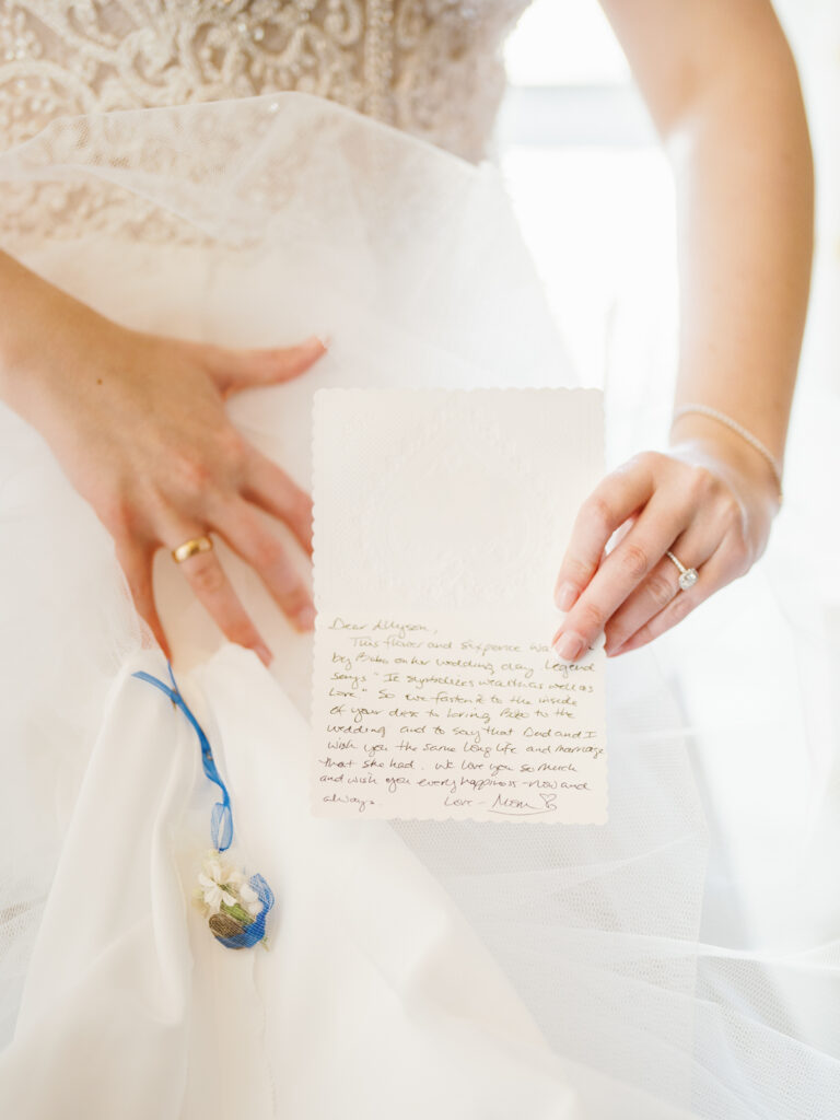 A bride read a letter from her parents at Sun Valley Lodge