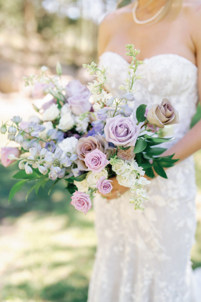 Bride with floral boquet by Rust and Thistle for a Sun Valley Wedding
