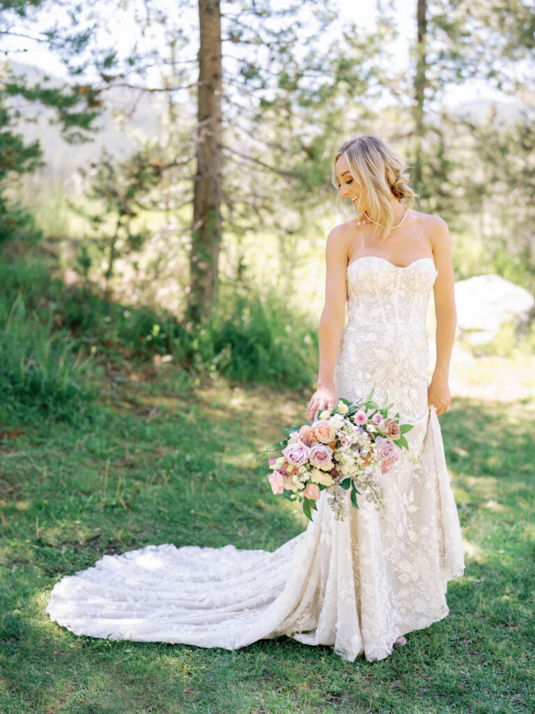 Bride wearing Made with Love Bridal Gown and florals by Rust and Thistle for a Sun Valley WeddingBride wearing Made with Love Bridal Gown and florals by Rust and Thistle for a Sun Valley Wedding at Galena Lodge