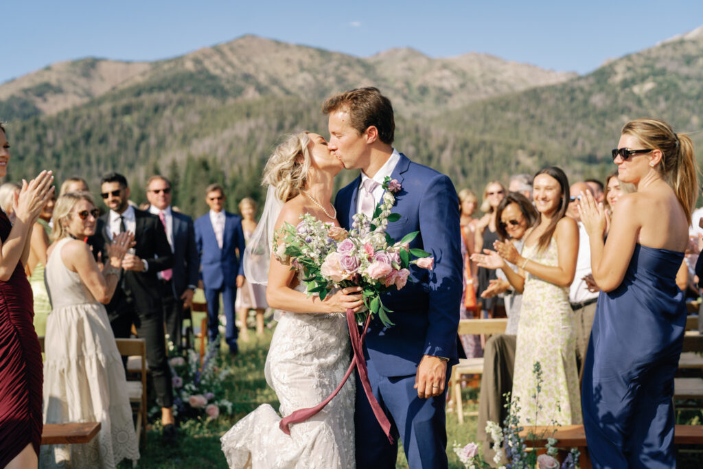 A bride and groom kiss in this Sun Valley wedding at Galena Lodge