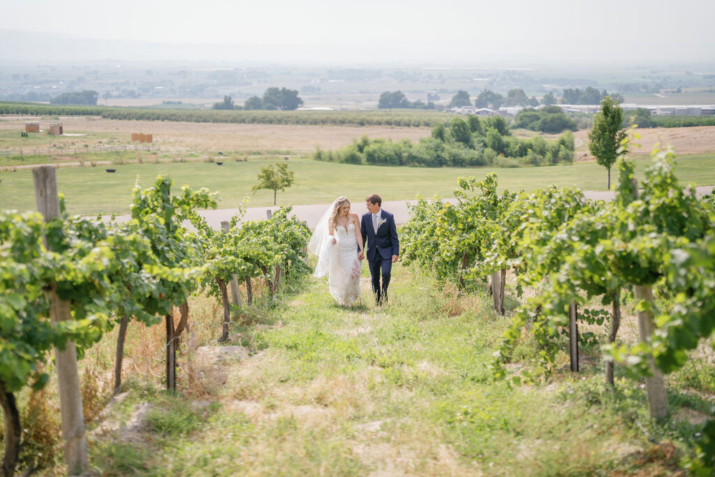 Boise wedding Venue Ste Chapel bride and groom in vineyard with view