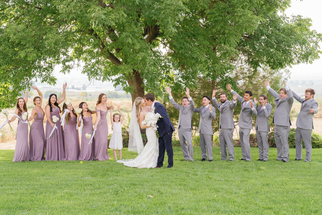 Boise wedding Venue Ste Chapel wedding party on  meadow 