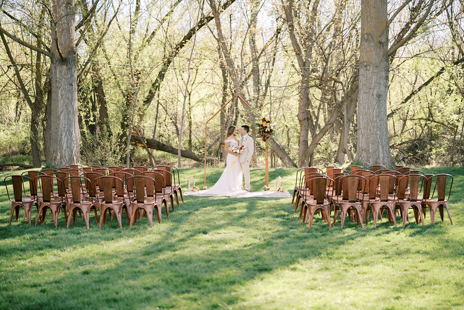 The Ultimate Guide to 28 of Boise Idaho's  Best Wedding Venues  Cottage at Riverbend Bride and groom ceremony
