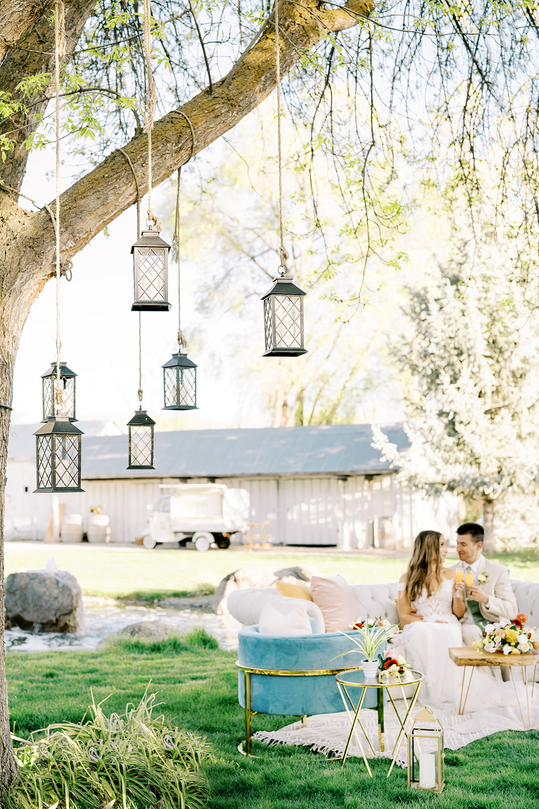 Boise Venue Cottage at Riverbend Bride and groom lanterns