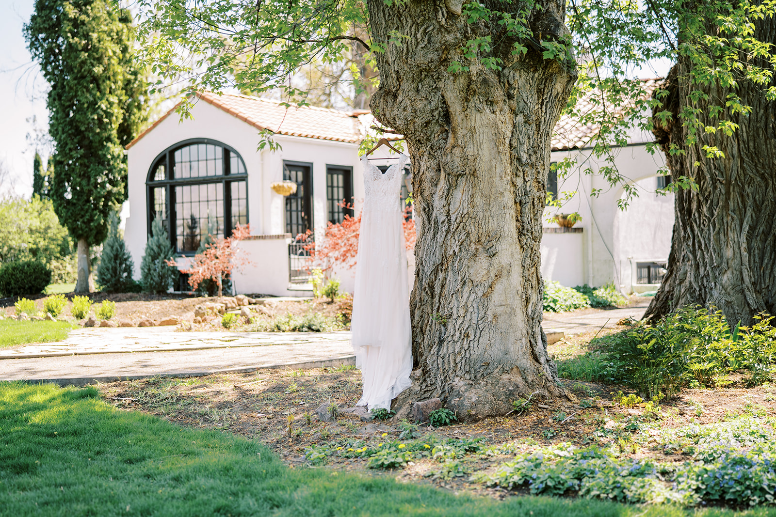 Boise Venue Cottage at Riverbend wedding dress hanging